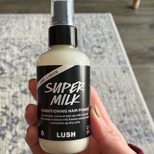Lush Super Milk Hair Primer - Black and Cream